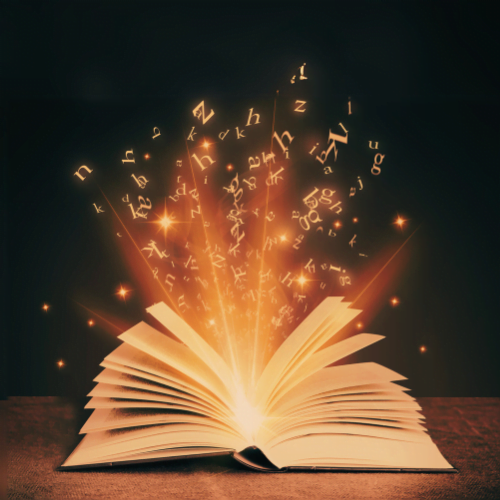 Open book with bright light and floating magical letters